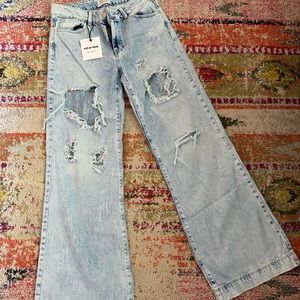 Women’s High Rise/ Loose Fit Distressed Jean NWT